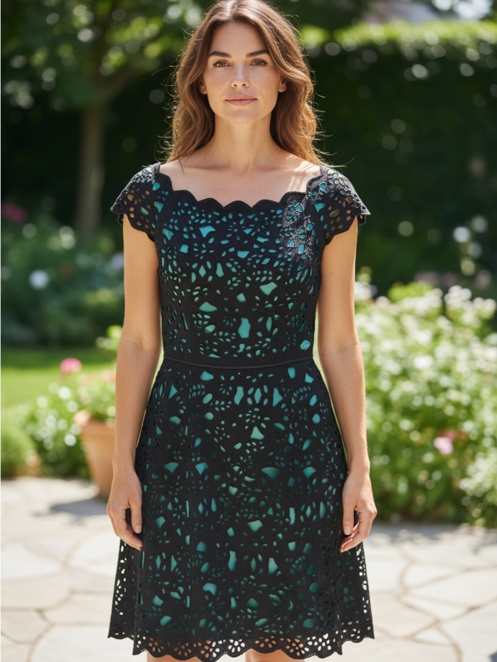 Black Laser-Cut Mini Dress with Teal Lining